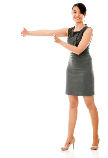 Businesswoman showing a gap - isolated over a white background